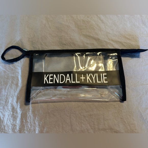 Kendall & Kylie Handbags - Kendall & Kylie Transparent Pouch with Black Accents